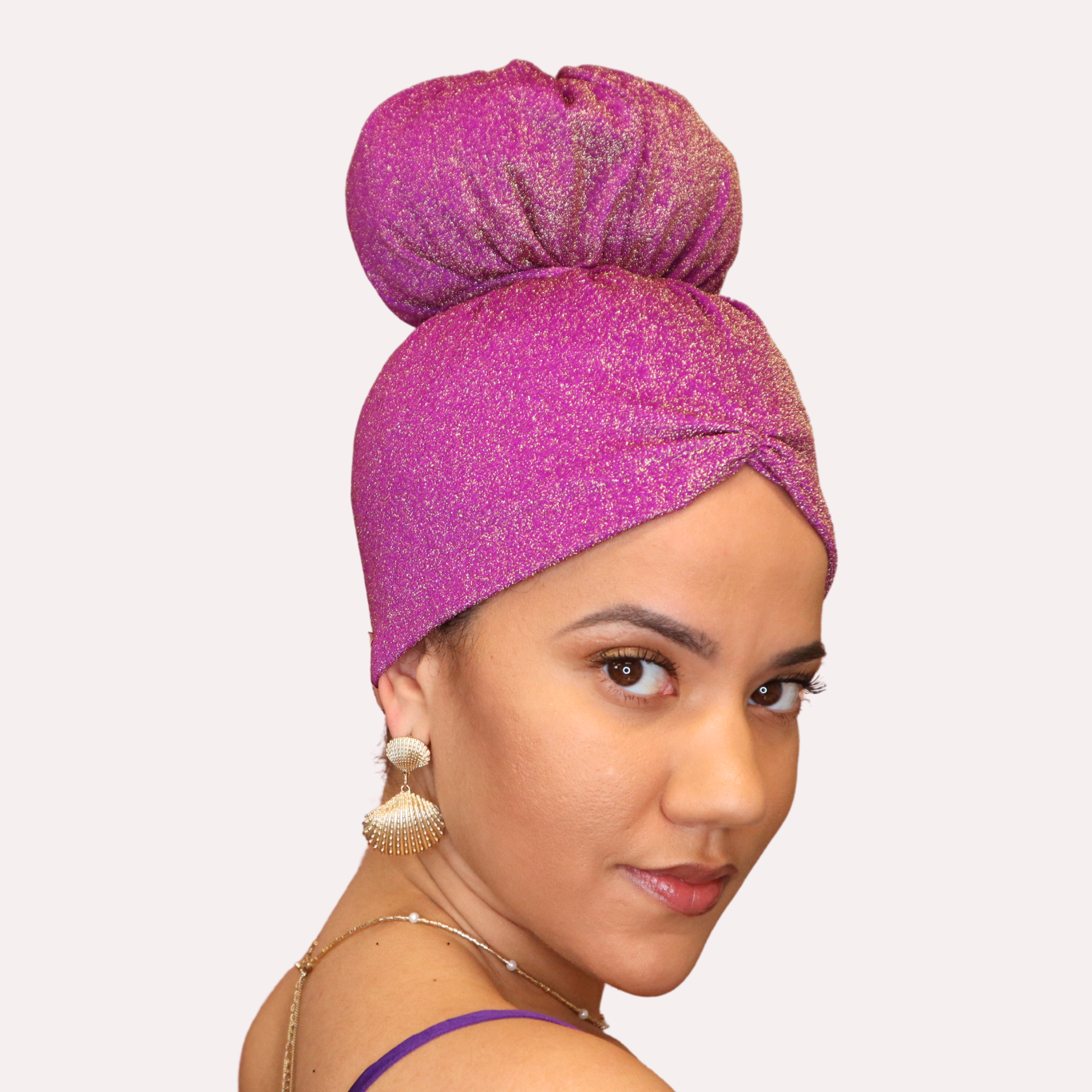 Violeta Anacaona Afrona in Crown Bun Style